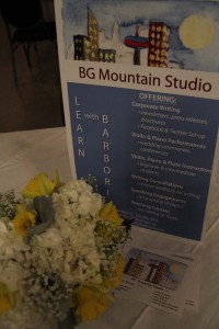 BG Mountain Studio's table display at the Okotoks Bridal Show on March 20th.  Thank you to Paisley Floral Design for the lovely flower arrangement!